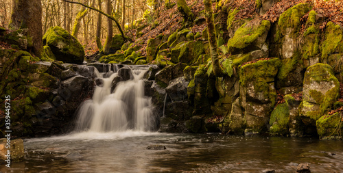 Mystique water fall in the middle of a forest