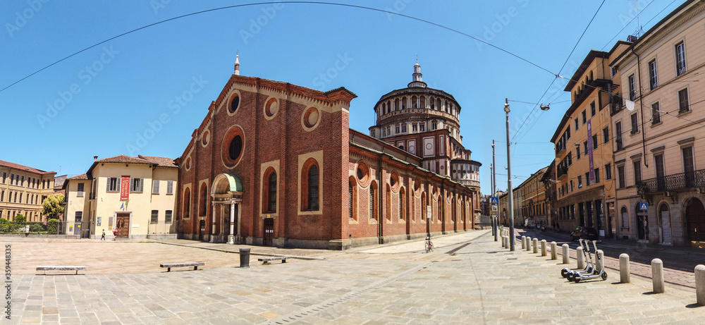 Fototapeta premium Panorama of the exterior of the Santa Maria delle Grazie Church where the fresco of Last Supper by Leonardo Da Vinci is located, Milano, Italy
