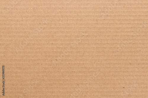 Brown cardboard sheet background, texture of recycle paper box.