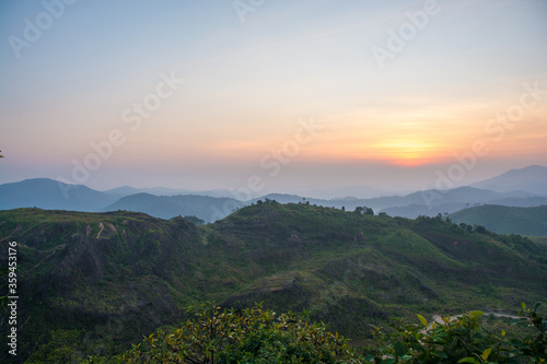 Landscape sunrise with mountain in the pilok , Kanchanaburi , Thailand © serra715