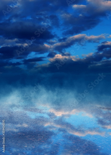 Bright blue sky at sunset. Reflection of the sky with clouds on wet asphalt. Empty Stage Background