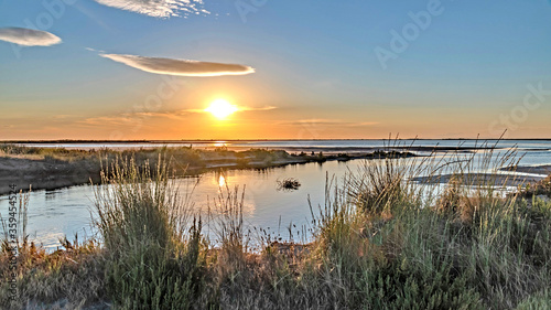 Принти на полотні Lever  coucher de soleil sur les marais salants de Camargue - Sunrise over the C