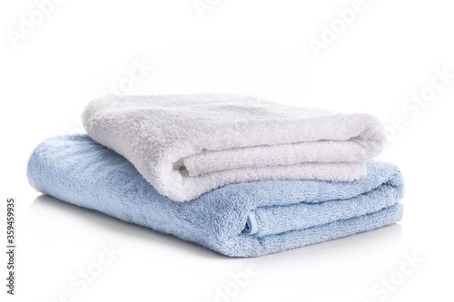 Pile of rainbow colored towels isolated