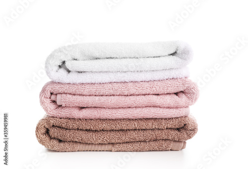 Pile of rainbow colored towels isolated