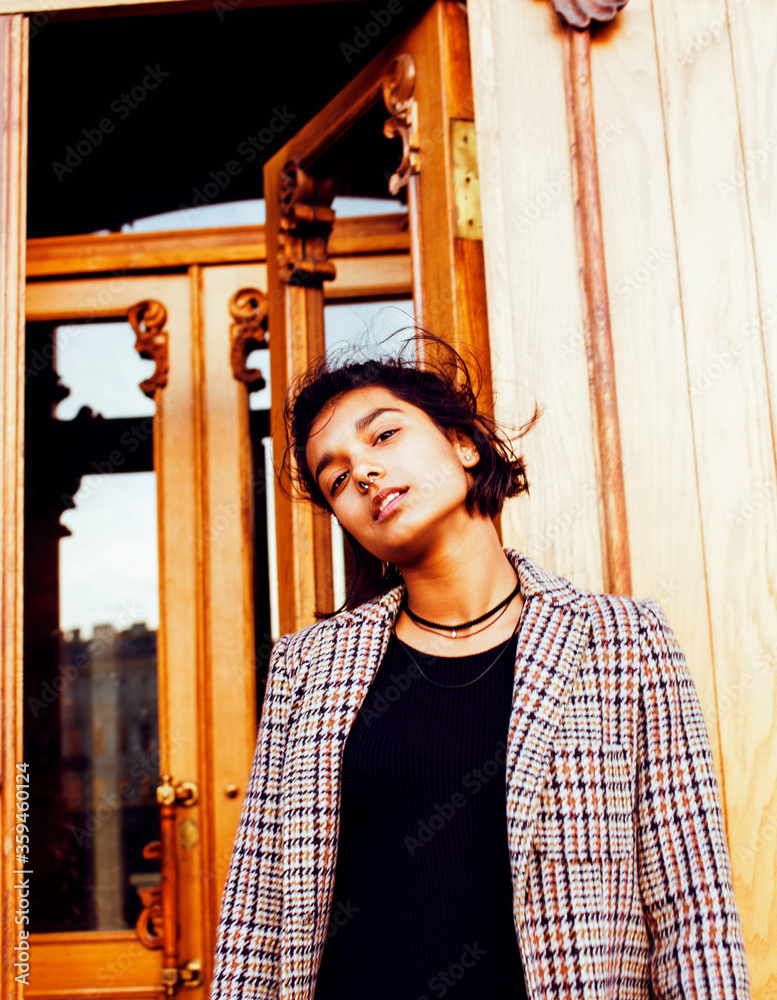 young pretty student teenage indian girl in doors happy smiling, having fun, lifestyle people concept