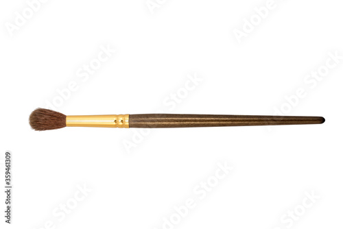Artist's brush with brown wooden handle on white background, isolated