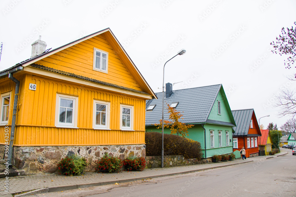 Old village wooden house in Trakai, Lithuania.Trakai is a town in southeastern Lithuania, west of Vilnius, the capital. Old village wooden house in Trakai, Lithuania.Trakai is a town in southeastern Lithuania, west of Vilnius, the capital.