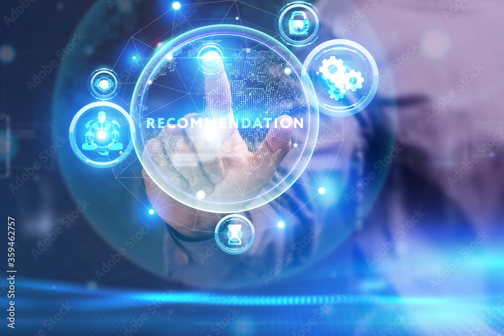 Business, Technology, Internet and network concept. Young businessman working on a virtual screen of the future and sees the inscription: Recommendation Business, Technology, Internet and network concept. Young businessman working on a virtual screen of the future and sees the inscription: Recommendation