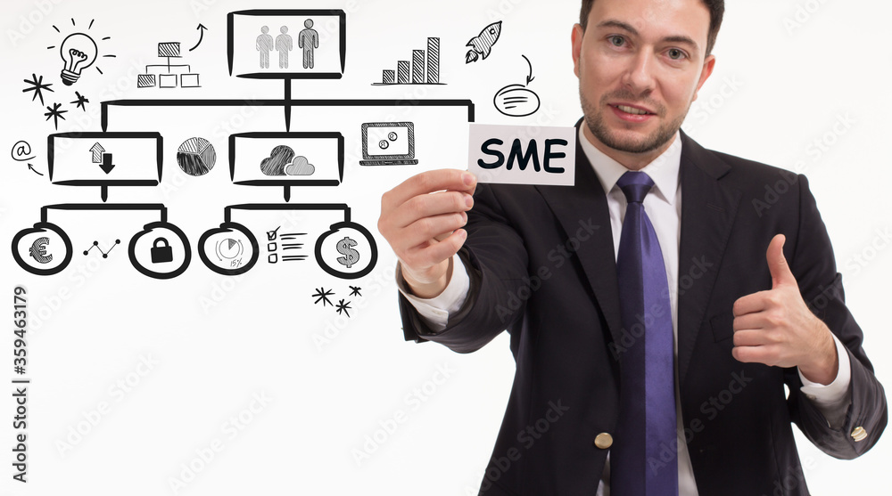 Business, technology, internet and network concept. Young businessman thinks over the steps for successful growth: SME Business, technology, internet and network concept. Young businessman thinks over the steps for successful growth: SME