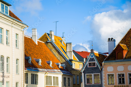 Buildings and architecture exterior view in old town of Tallinn, colorful old style houses and street situation. Tallinn, Estonia. photo
