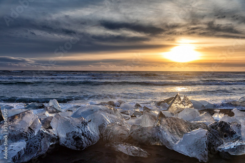 Chucks of ice on Diamond Beach  Iceland  at sunrise