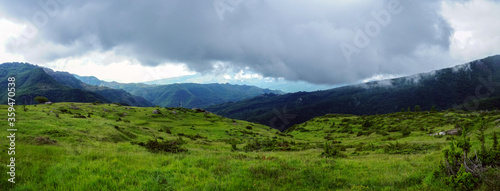 Panoramic green landscape with dramatic sky, Gran Sasso, Abruzzo, Italy