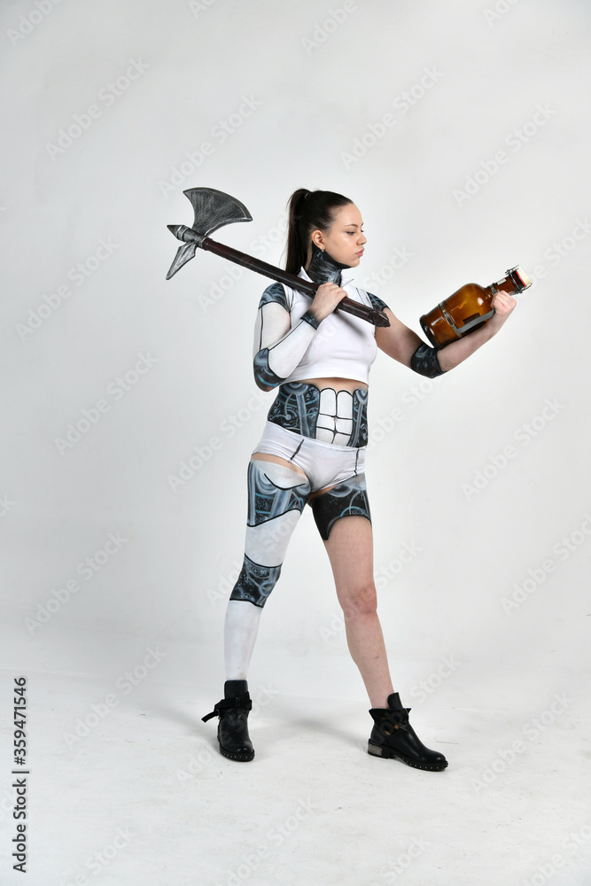 beautiful girl in a robot suit with a battleaxe and an old wine in hand beautiful girl in a robot suit with a battleaxe and an old wine in hand