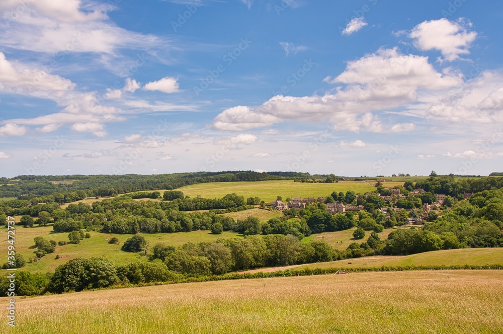 A view of the Cotswold village of Snow Hill, Gloucestershire on a sunny summer's day.