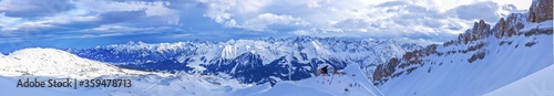 Panoramic picture of Ifen ski lift mountain station at daytime with blue skies in winter during skiing season © Aquarius