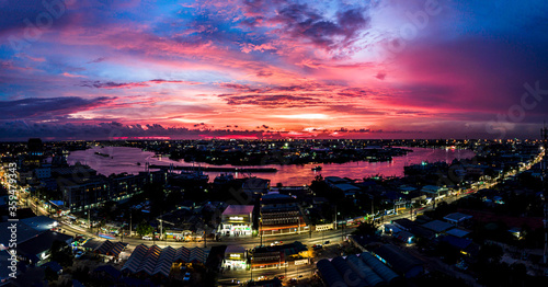 Samutsakorn at thailand, waterfont with boat,twighlight time ,Aerial drone view. photo