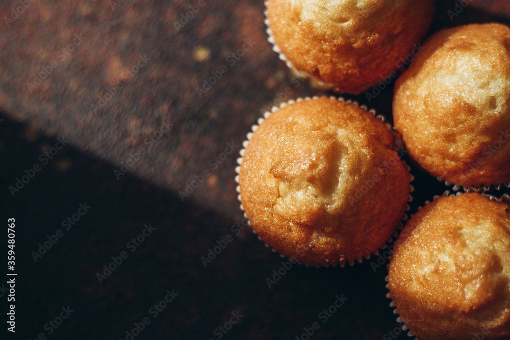 Beautiful tasty muffins on a dark background Beautiful tasty muffins on a dark background