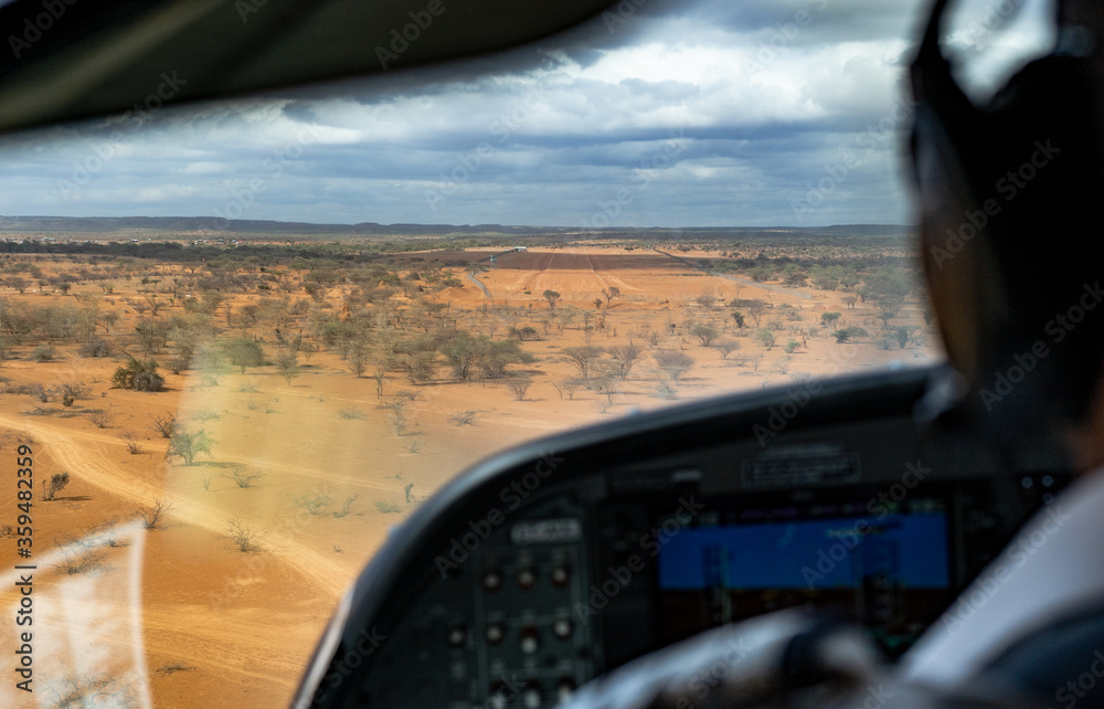 Bush pilot perspective view on sandy landing strip airfield in rural Melkadida, Dollo Ado, Somalia region, Ethiopia, Africa Bush pilot perspective view on sandy landing strip airfield in rural Melkadida, Dollo Ado, Somalia region, Ethiopia, Africa