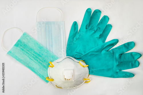 Surgical, 3M medical protective masks, gloves on the table photo