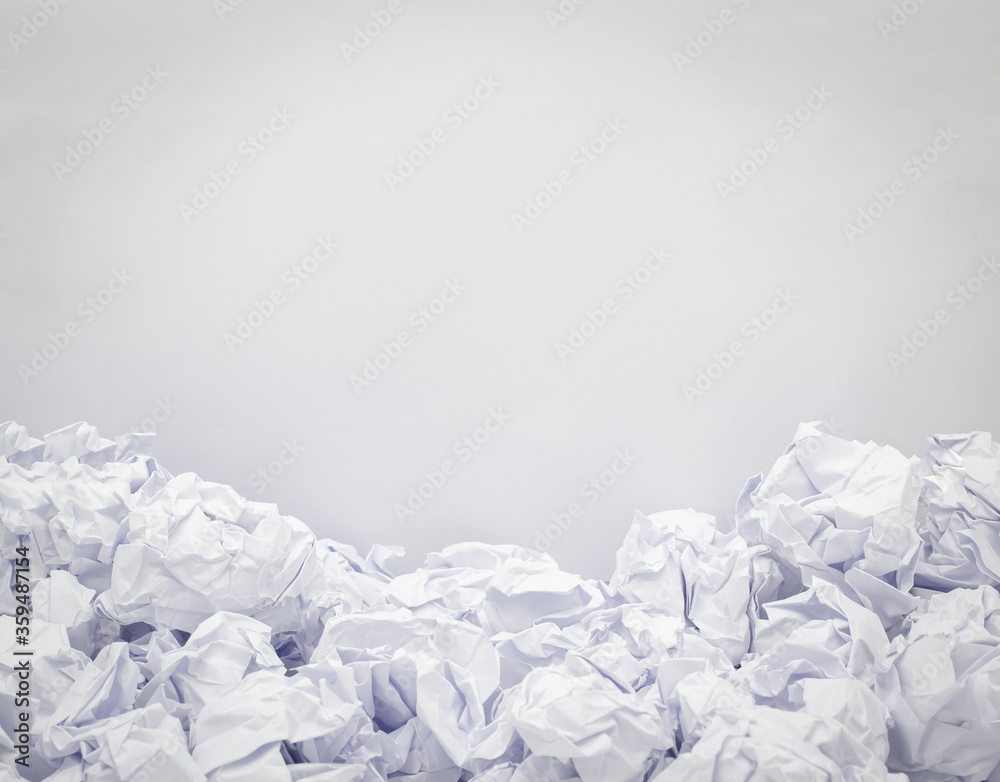 crumpled paper with a backdrop of white paper,Copy space