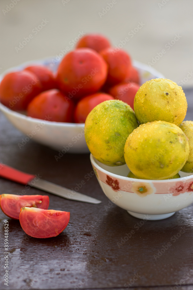yellow organic lemons in a bowl yellow organic lemons in a bowl