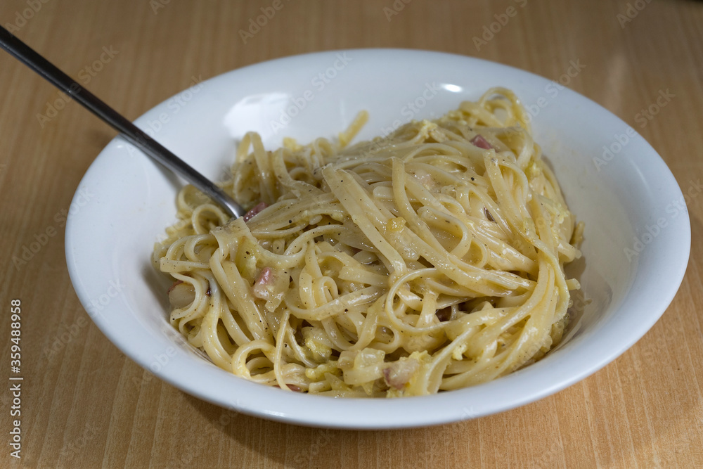 traditional italian homemade dish of spaghetti a la carbonara