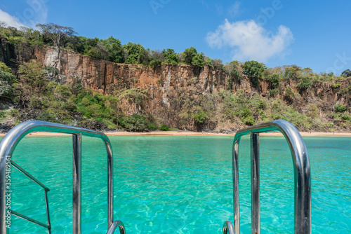 The Beautiful view of Sancho Beach from the sea, with turquoise clear water, at Fernando de Noronha Marine National Park, a Unesco World Heritage site, Pernambuco, Brazil