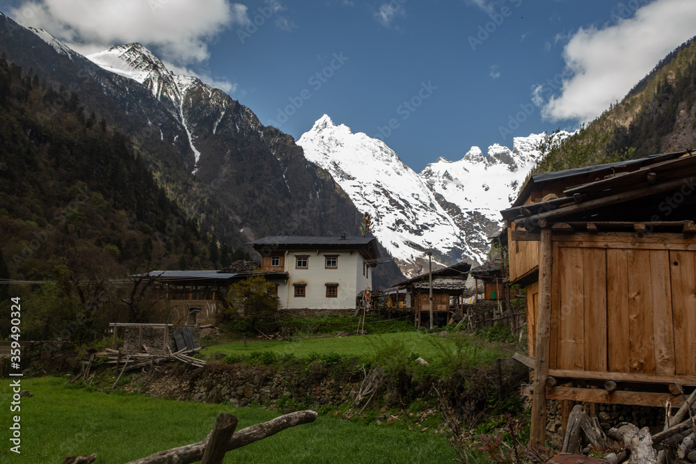 Yubeng, a small Tibetan village in the valley of snow mountain Meili, in Tibet, China. Yubeng, a small Tibetan village in the valley of snow mountain Meili, in Tibet, China.