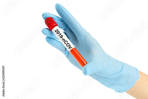 Coronavirus concept. Text 2019-nCov on test tube in female hand