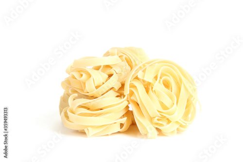 Uncooked noodles pasta isolated on white background