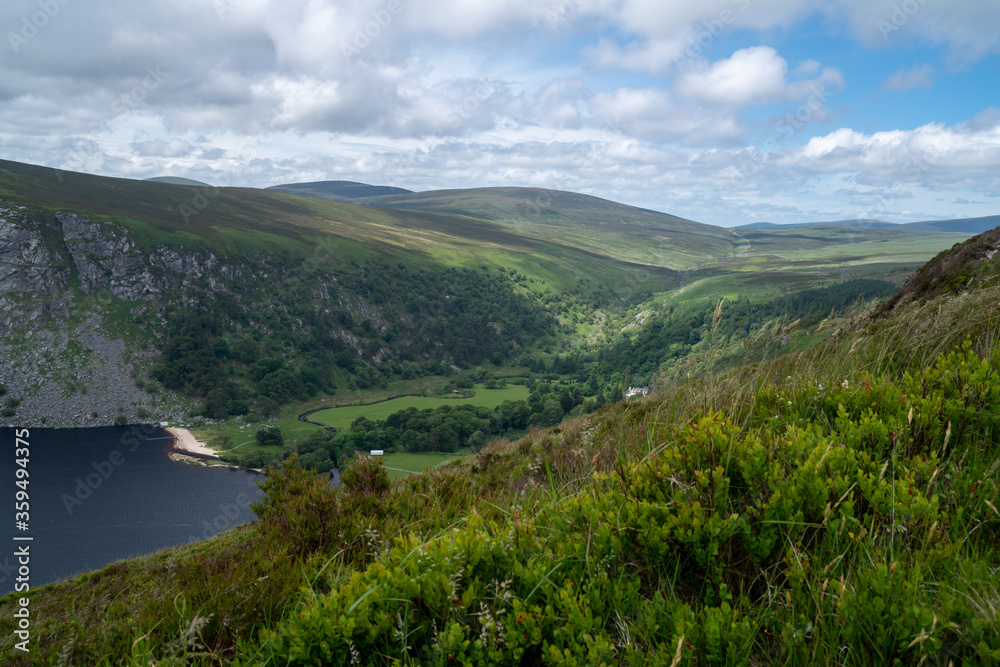 Panoramic view of  The Guinness Lake (Lough Tay) -  a movie and series location, such as Vikings. Close to Dublin City, popular tourist destination.
