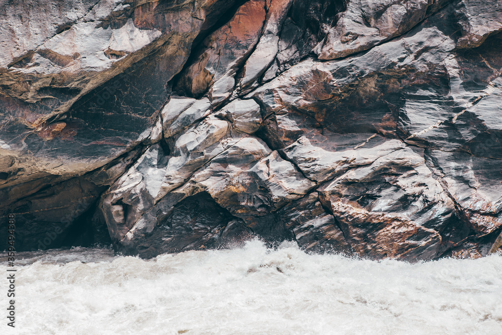 A strong water stream in Tiger leap Gorge, Yunnan, China. A strong water stream in Tiger leap Gorge, Yunnan, China.