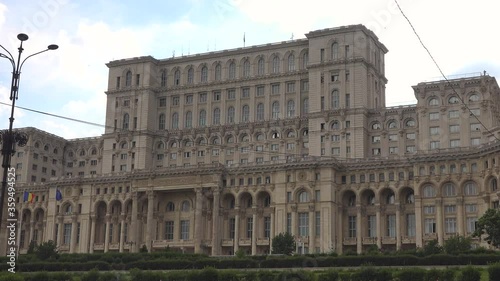 4k video Exterior of Romania’s Palace of Parliament, known as House of the People. Built in Bucharest by dictator Nicolae Ceausescu during the communist Romania photo