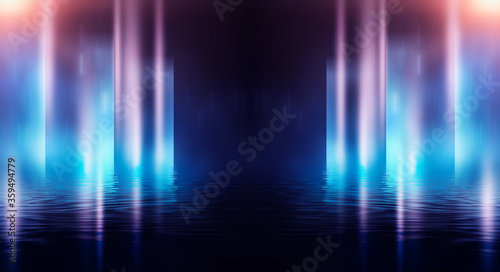 Background of empty stage show. Neon blue and purple light and laser show. Laser futuristic shapes on a dark background. Abstract dark background with neon glow