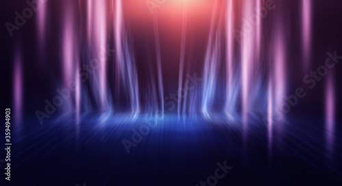Background of empty stage show. Neon blue and purple light and laser show. Laser futuristic shapes on a dark background. Abstract dark background with neon glow