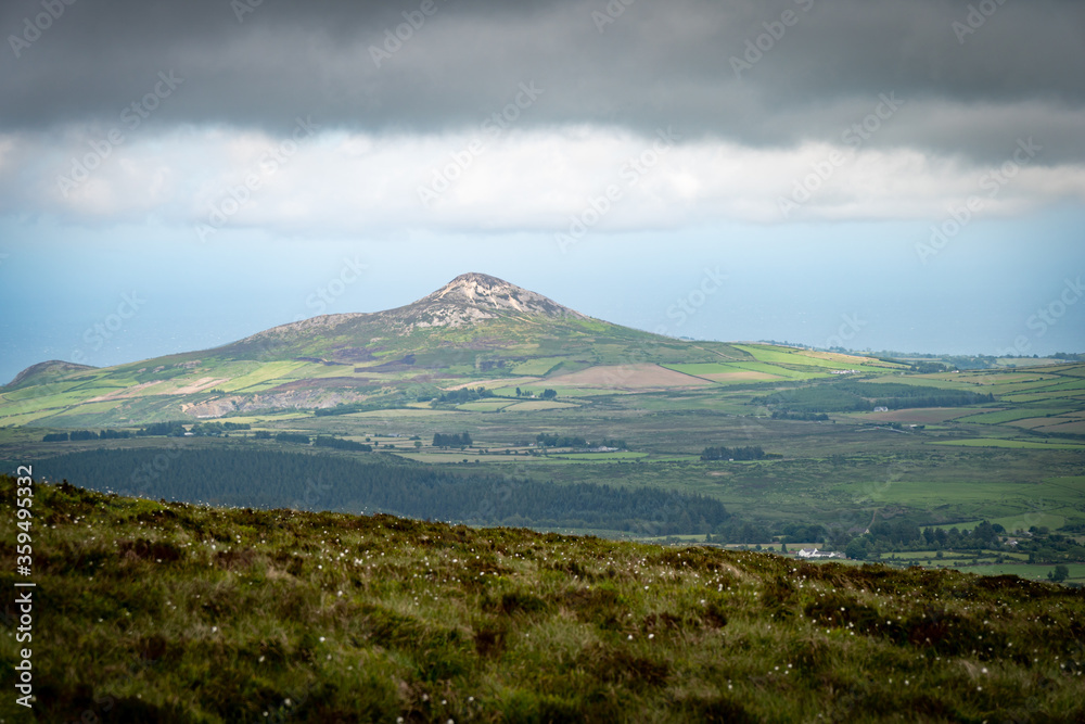 Panoramic view of Wicklow Mountains. This place is famous for uncontaminated nature, misty landscapes and lakes. Panoramic view during summer time
