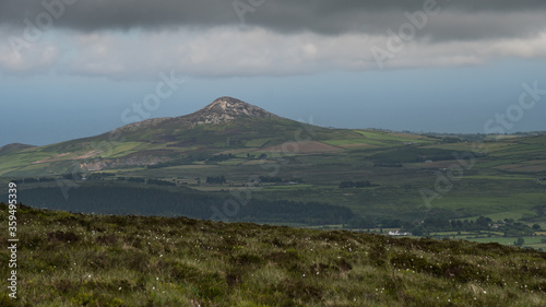 Panoramic view of Wicklow Mountains. This place is famous for uncontaminated nature, misty landscapes and lakes. Panoramic view during summer time 