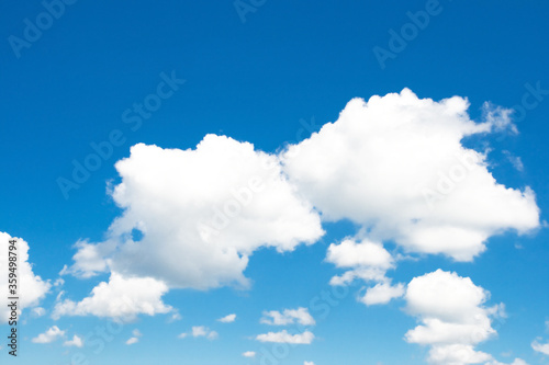 Summer blue sky with perfect white clouds. Cloudscape background