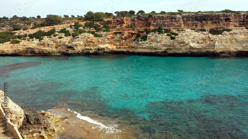 Rocky coast and bay with turquoise water in Majorca, Spain