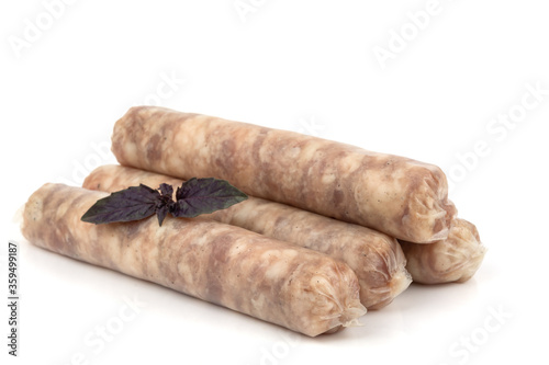 homemade sausages kupaty raw meat isolate on white photo