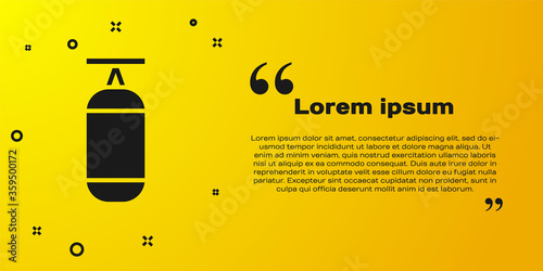 Black Punching bag icon isolated on yellow background.  Vector Illustration