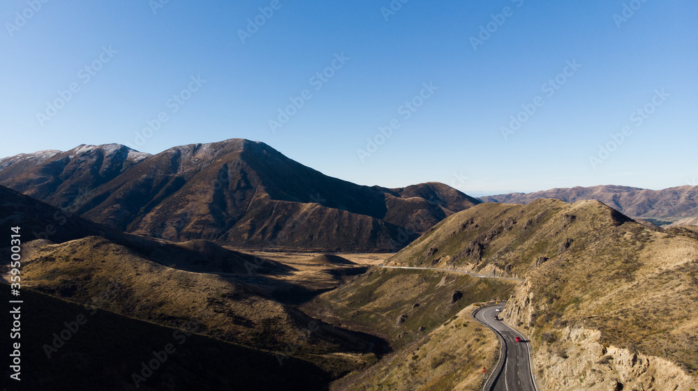 Naklejka premium Beautiful highway road with mountain in rural on day time.