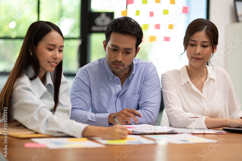 Group of young Startup coworkers working together to get ideas