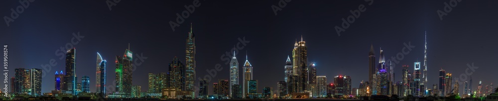 Night panorama picture of Dubai skyline in spring