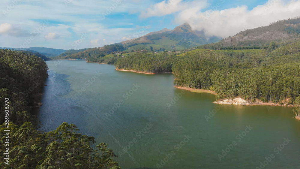 Aerial view beautiful nature with mountains and hills by Lake Mattupetty. Kerala State. Near the city of Munar.