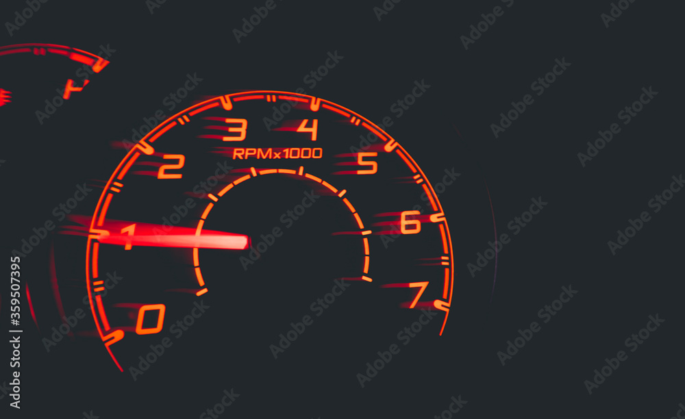 Fototapeta premium Driver's cockpit ; speedometer on dashboard - colorful light in black, copy space for your abstract design 