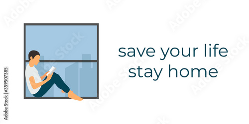 Boy sits in the window and reads a book. Self-quarantine concept. Covid-19 virus in air. Staying home with self quarantine. Protect from viruses. Stay at home during the coronavirus epidemic.