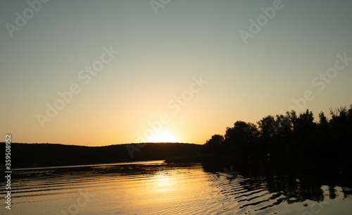 Beautiful sunset reflected in the lake.