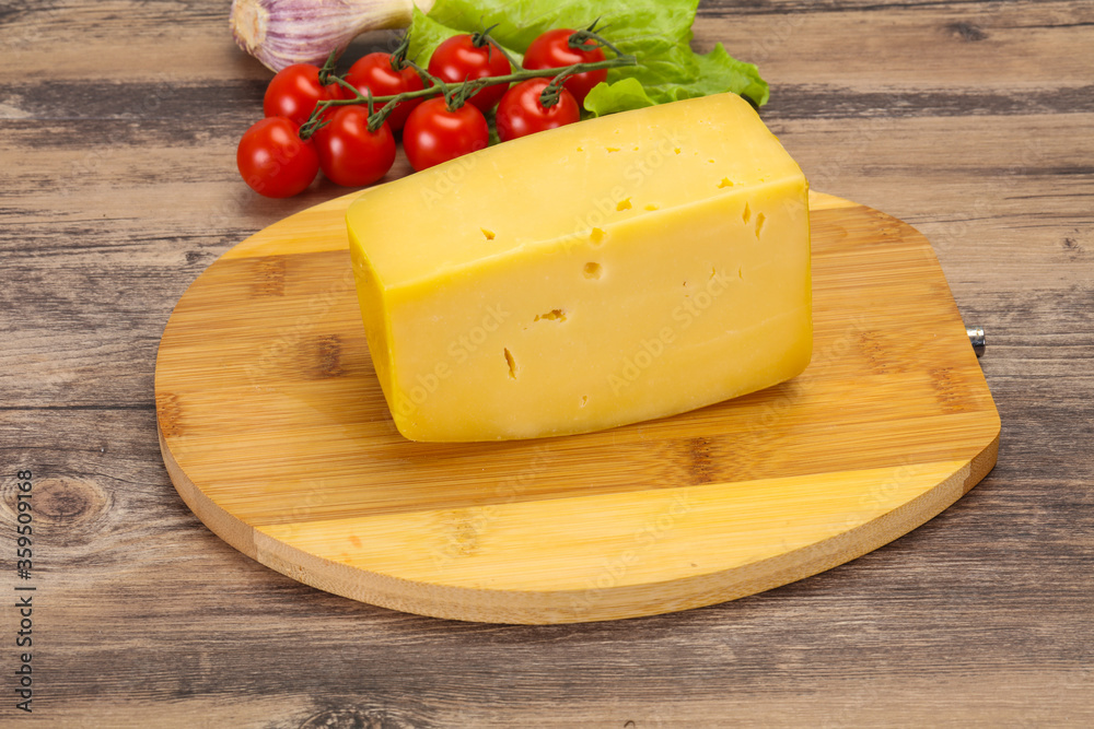 Hard yellow tasty cheese brick Hard yellow tasty cheese brick