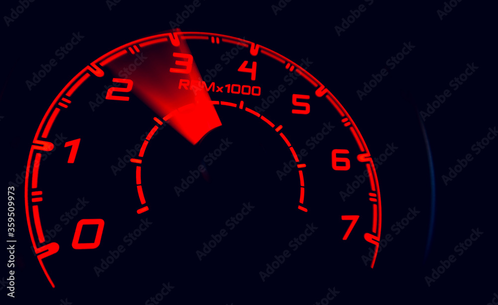 Driver's cockpit ; speedometer on dashboard - colorful light in black, copy space for your abstract design Driver's cockpit ; speedometer on dashboard - colorful light in black, copy space for your abstract design